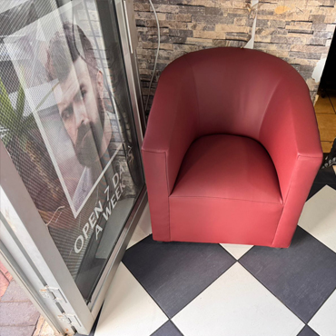 Reupholstered tub chair